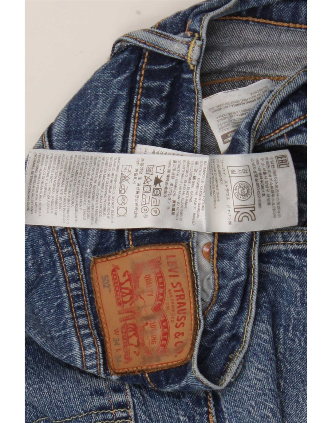 Męskie jeansy Levi's 502 zwężane W34 L34 niebieska bawełna