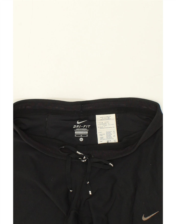 NIKE Womens Dri Fit Capri Tracksuit Trousers UK 12 Medium Black Polyester Vintage Nike and Second-Hand Nike from Messina Hembry 