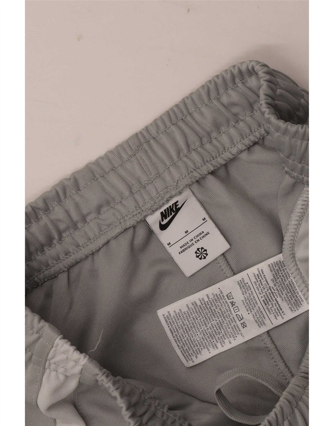 Męskie spodnie dresowe Nike Graphic Dresy Joggery w kolorze średnioszarym