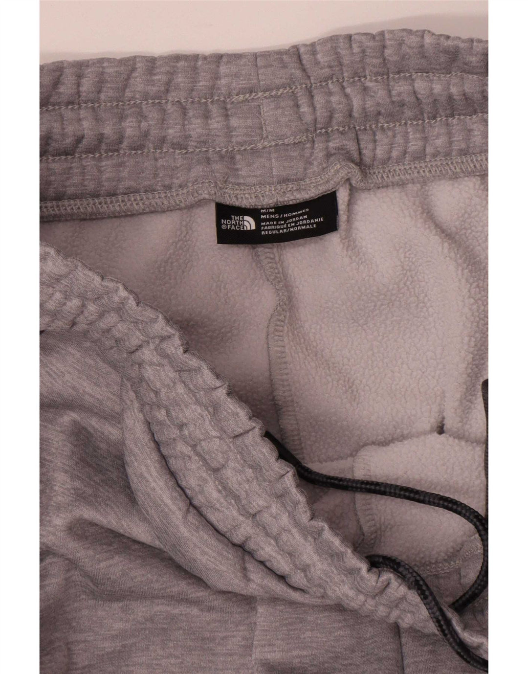 Męskie spodnie dresowe The North Face Joggers w kolorze średnioszarym