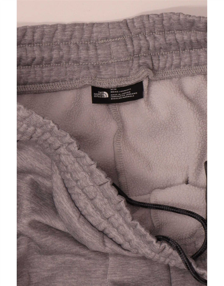 Męskie spodnie dresowe The North Face Joggers w kolorze średnioszarym