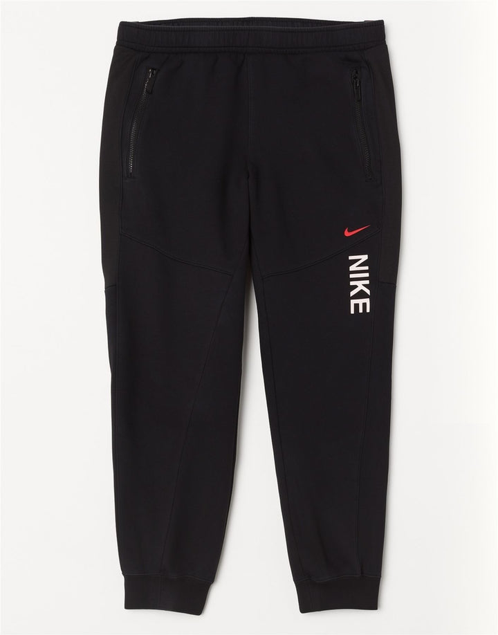 Męskie spodnie dresowe Nike Graphic Joggers, średnia czarna bawełna