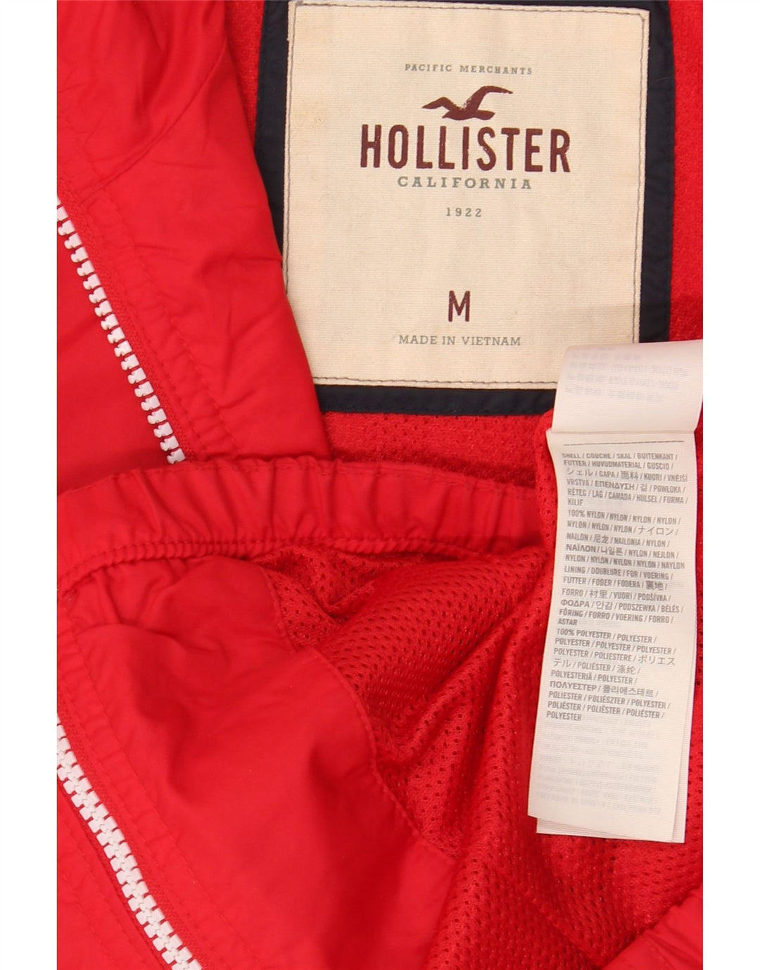 Damska kurtka przeciwdeszczowa z kapturem Hollister UK 12, nylon w kolorze średnio czerwonym
