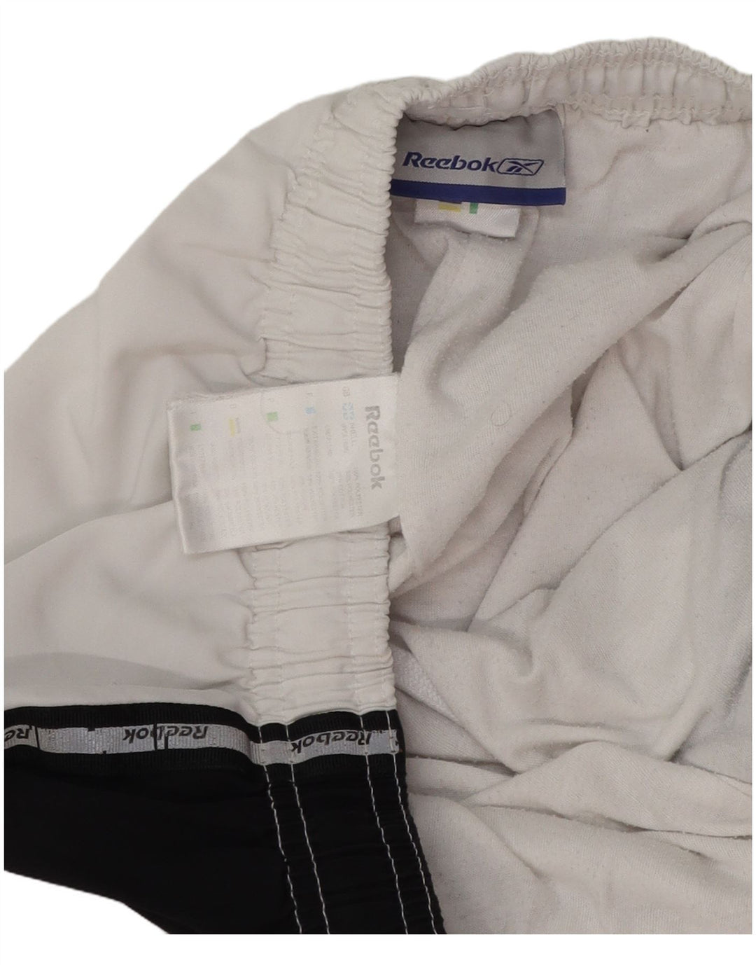 Męskie spodnie dresowe Reebok z grafiką, poliester w kolorze średniej bieli