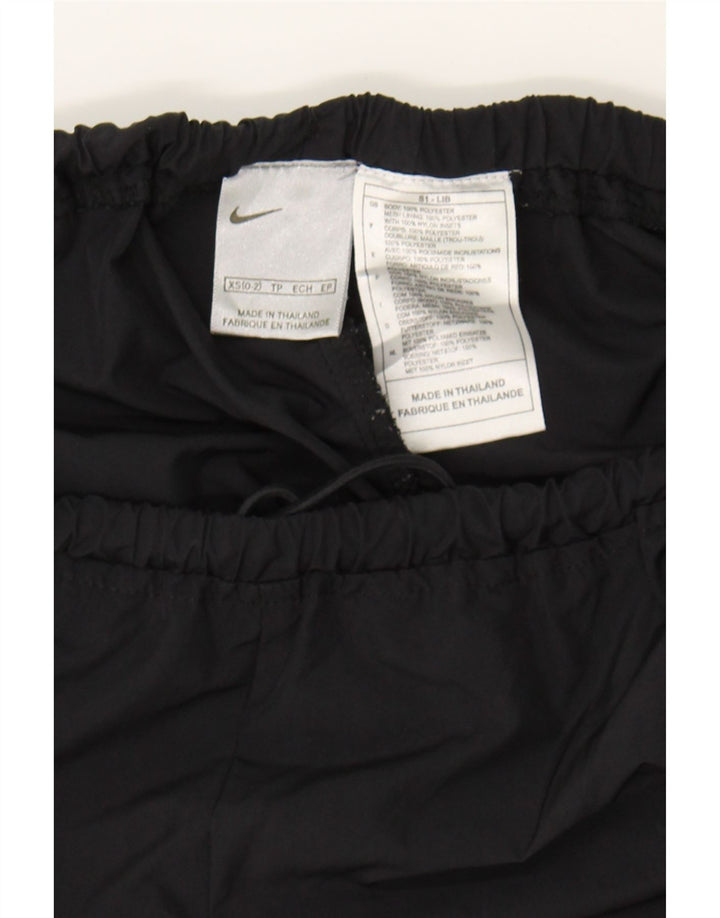 NIKE Womens Tracksuit Trousers US 0/2 XS  Black Polyester Vintage Nike and Second-Hand Nike from Messina Hembry 