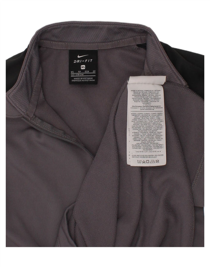 NIKE Boys Dri Fit Pullover Tracksuit Top 6-7 Years XS Grey Colourblock Vintage Nike and Second-Hand Nike from Messina Hembry 