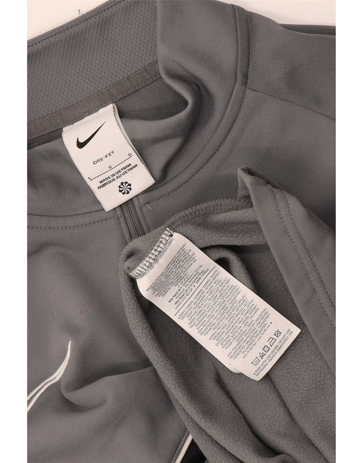 Męski dres Nike Dri Fit z zamkiem błyskawicznym i dużym szarym blokiem kolorów