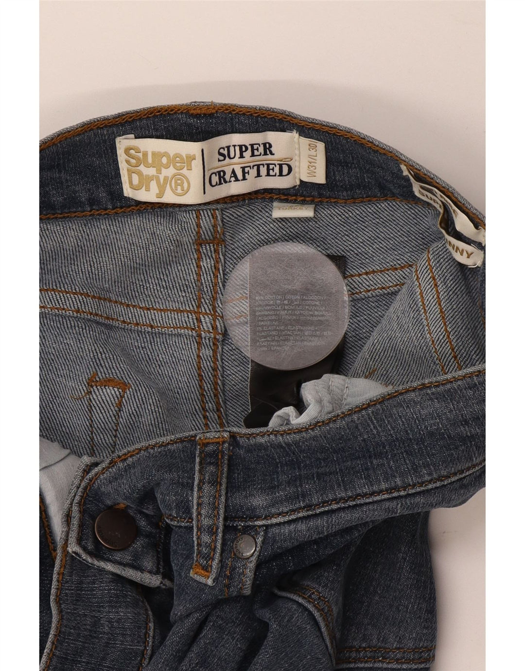 SUPERDRY Damskie super obcisłe dżinsy ze średnim stanem W31 L30 Granatowa bawełna