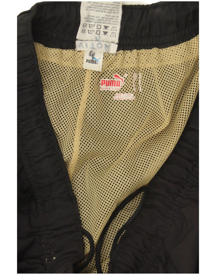 Męskie spodnie dresowe PUMA Portugalia, duży granatowy poliester