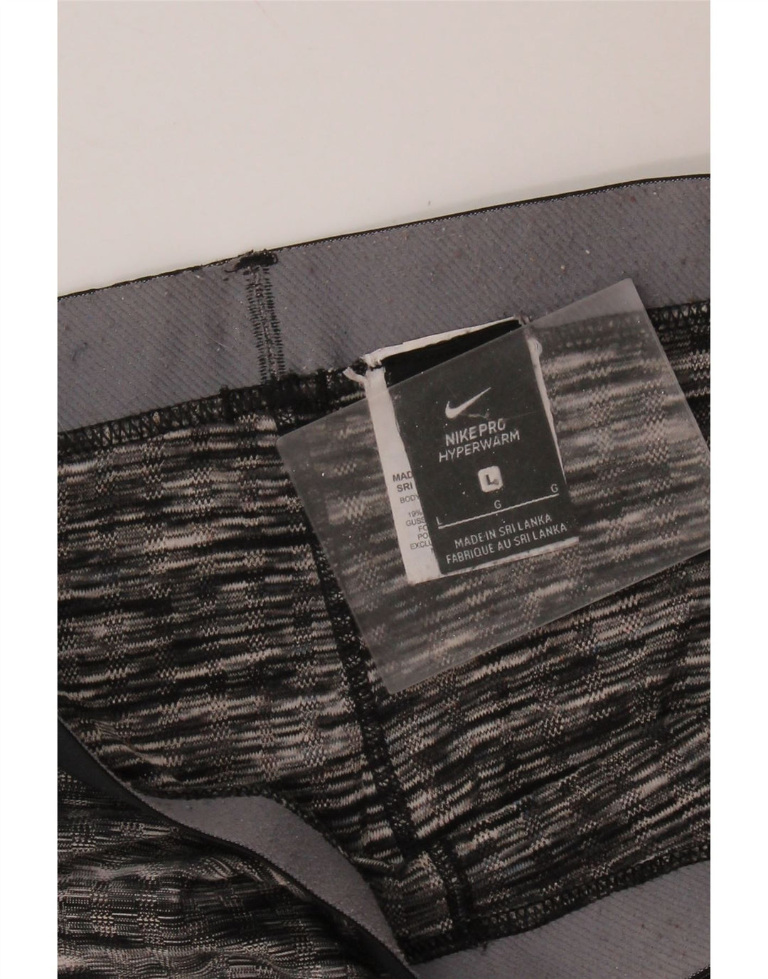 Damskie legginsy NIKE Graphic UK 14, duże, czarne, poliestrowe paski