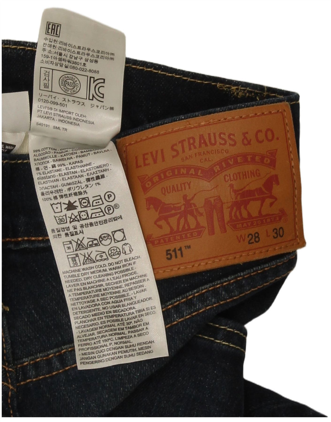 Męskie jeansy Levi's 511 Slim W28 L30 Granatowa bawełna