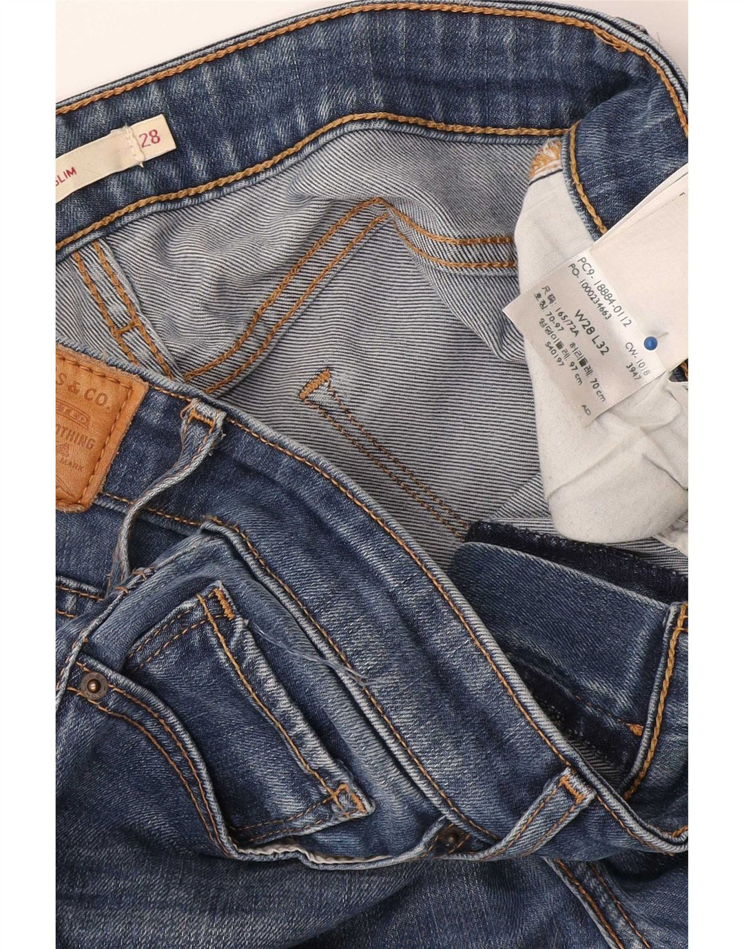 Damskie jeansy Levi's 712 Slim W28 L32 Niebieski Lyocell