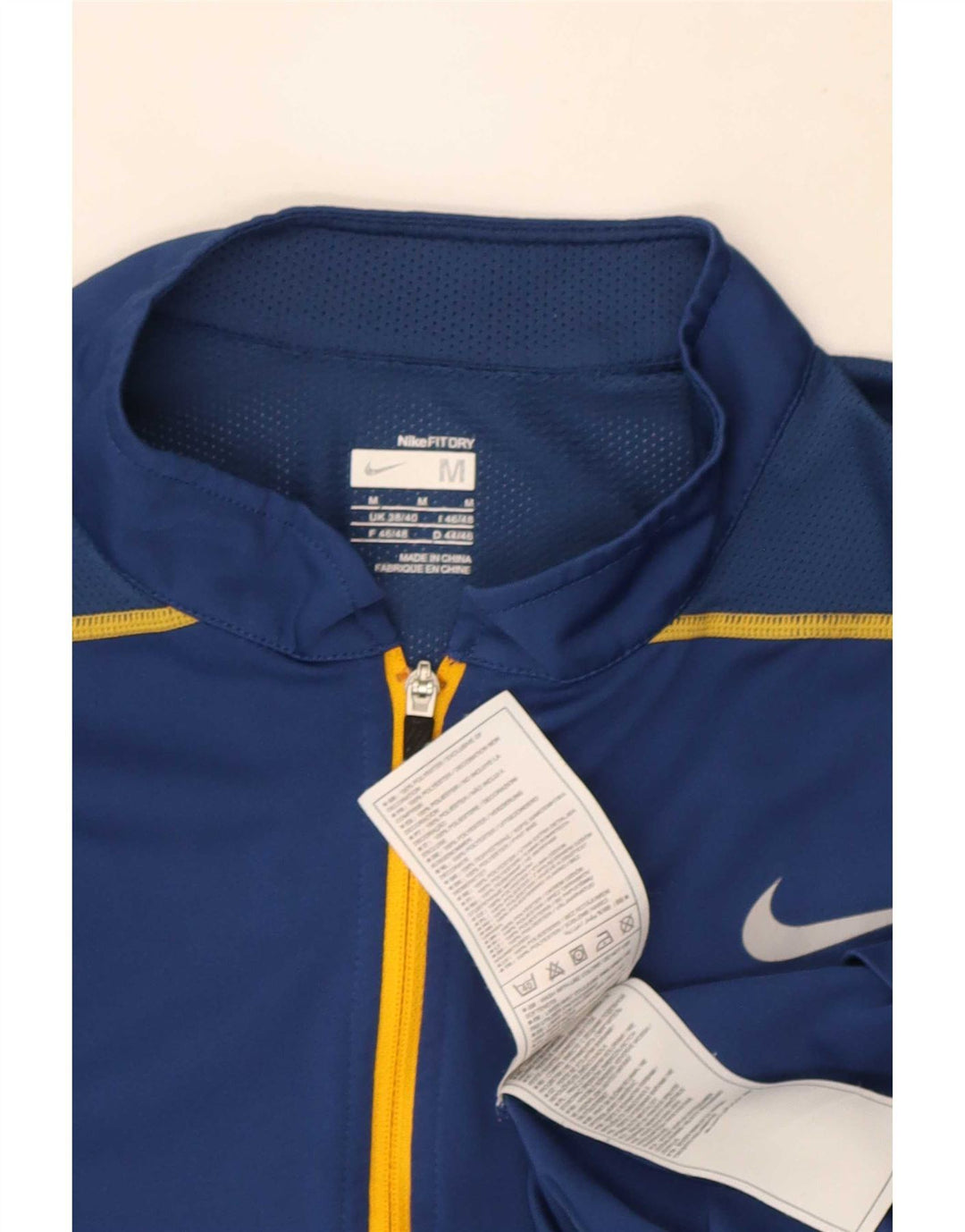 Męski T-shirt Nike z zamkiem błyskawicznym, UK 38/40, średni niebieski, poliester z blokami kolorów