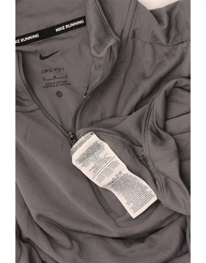 Damski dres Nike Dri Fit z zamkiem błyskawicznym na szyi, UK 12, średni szary