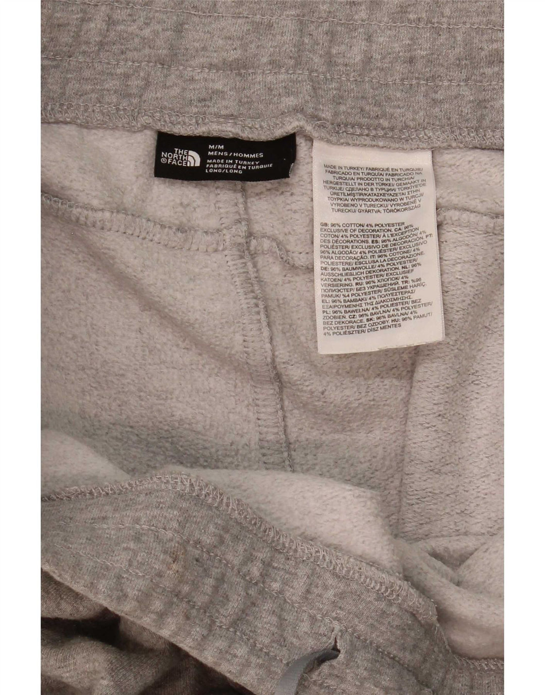 Męskie spodnie dresowe The North Face Graphic, średnioszare, nakrapiane