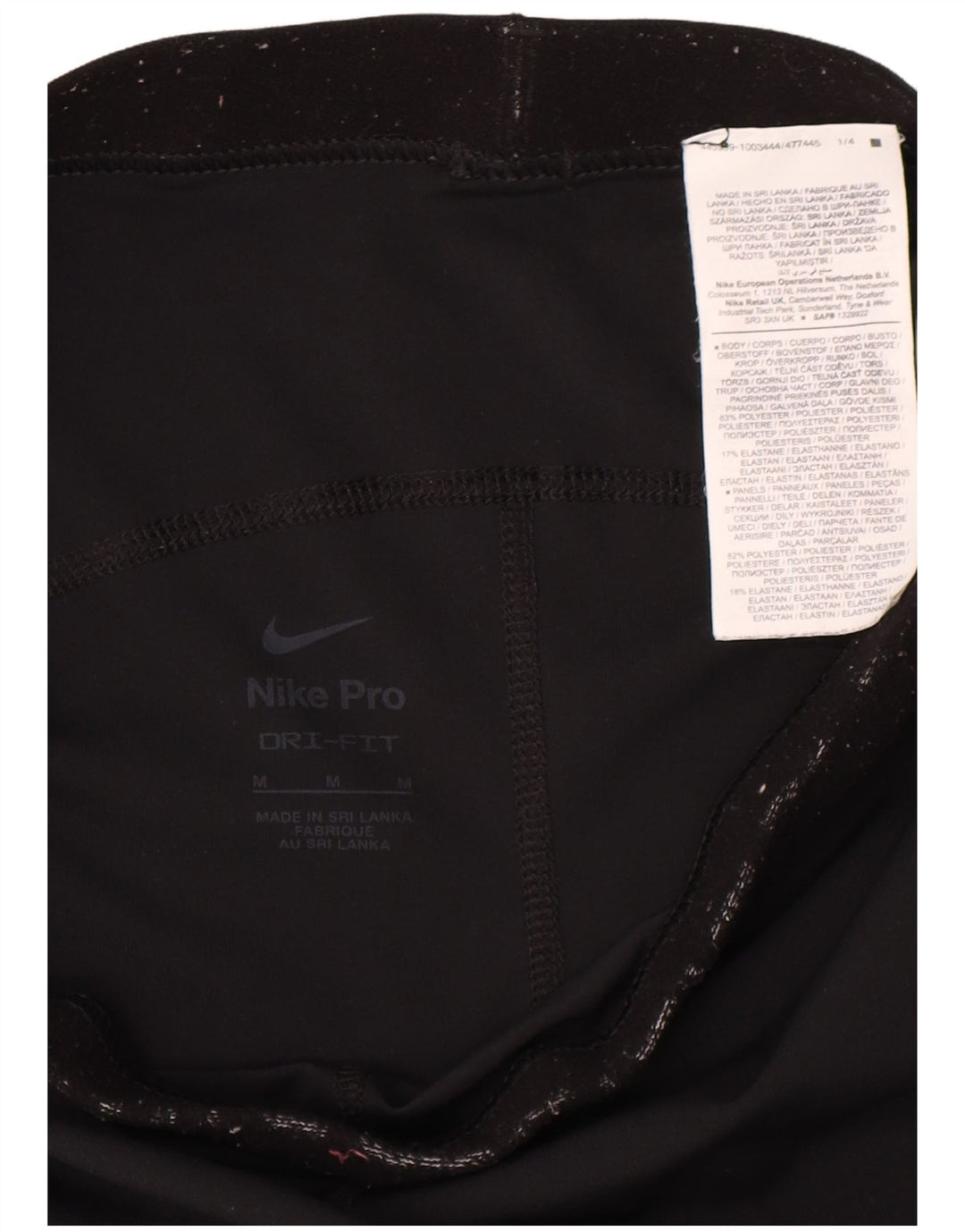 Damskie legginsy Nike Dri Fit Graphic UK 12, średni czarny poliester