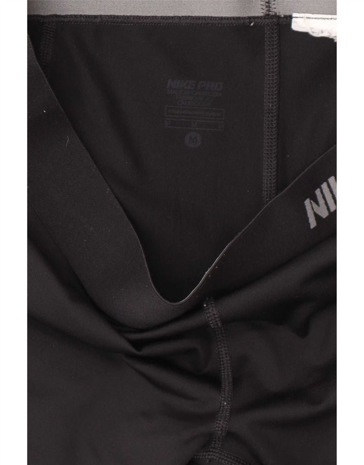 Damskie legginsy Nike Capri UK 12, średnie czarne