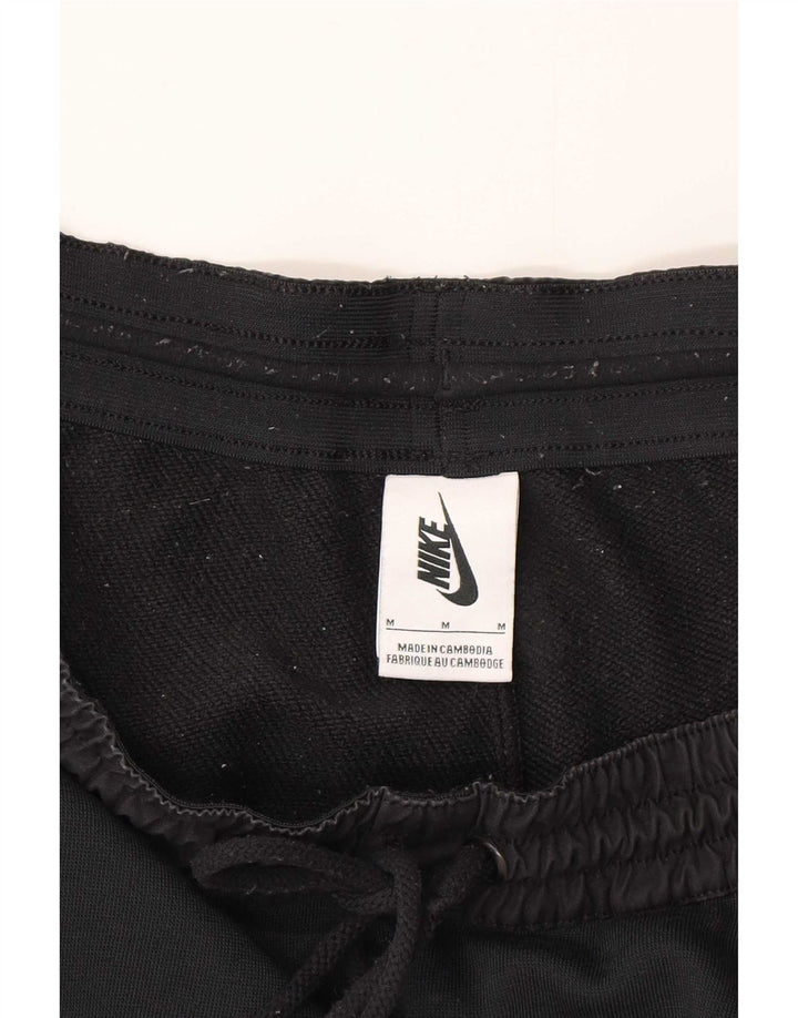 Męskie spodnie dresowe Nike Graphic, joggery, średni czarny poliester