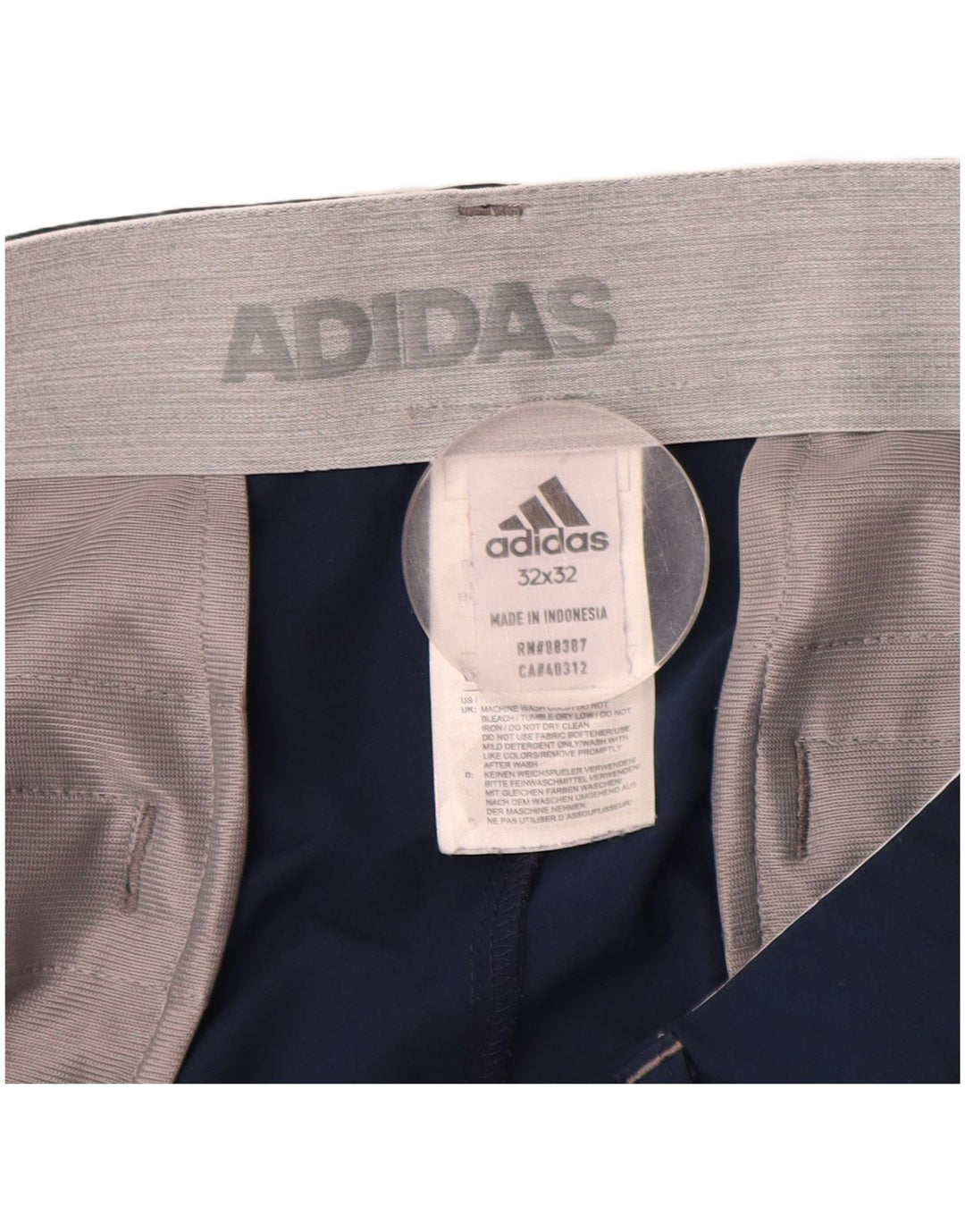Męskie spodnie typu slim chino ADIDAS W32 L32 granatowy poliester