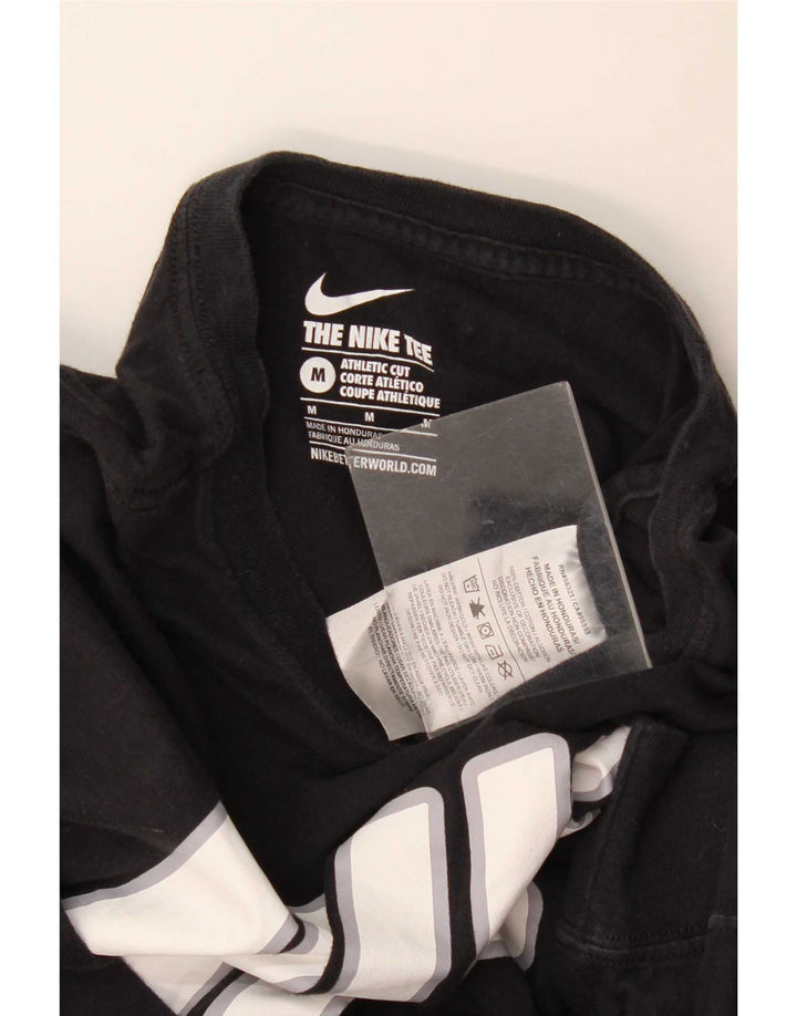 Męska koszulka Nike o sportowym kroju z grafiką, z długim rękawem, w kolorze średniej czerni