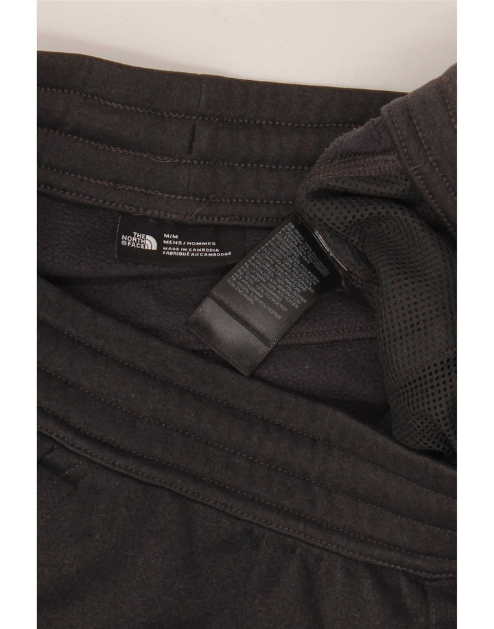 Męskie spodnie dresowe The North Face Joggery w kolorze średnioszarym, z poliestru
