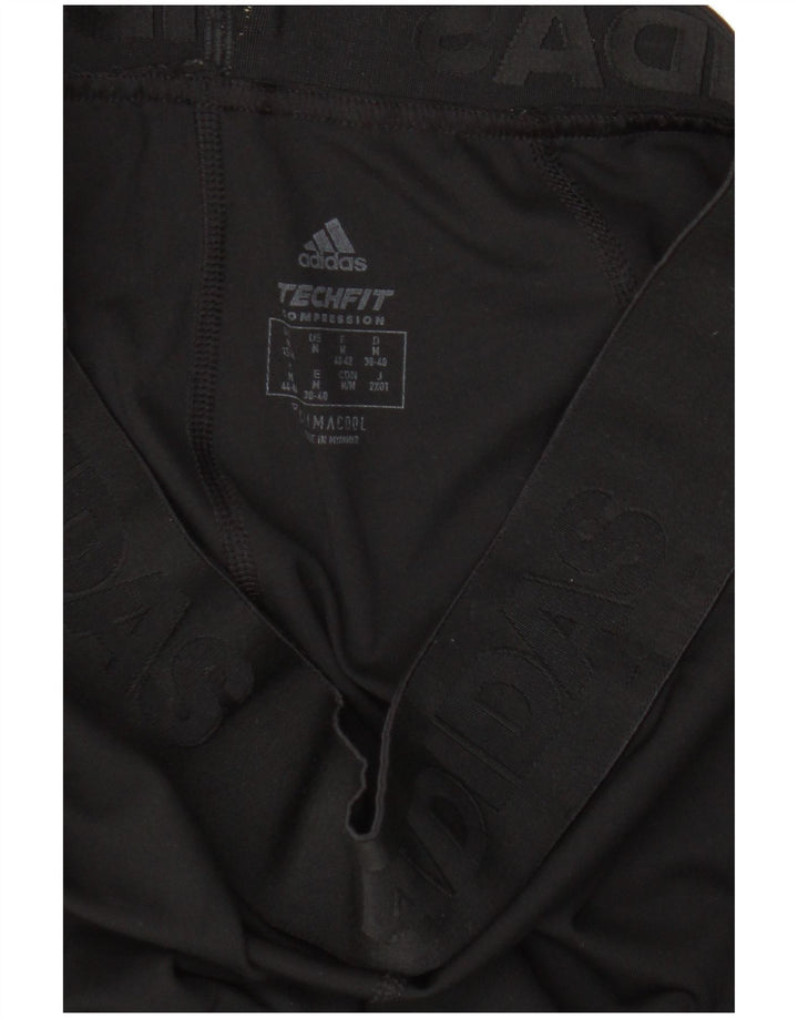 Damskie legginsy Adidas Graphic UK 12/14 Medium Black