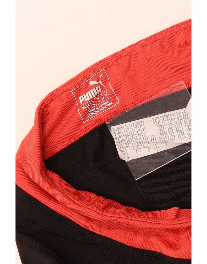 Damskie legginsy Capri Puma UK 14, poliester w kolorze średniej czerni