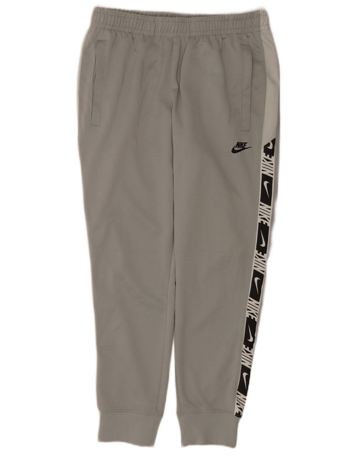 Męskie spodnie dresowe Nike Graphic Dresy Joggery w kolorze średnioszarym