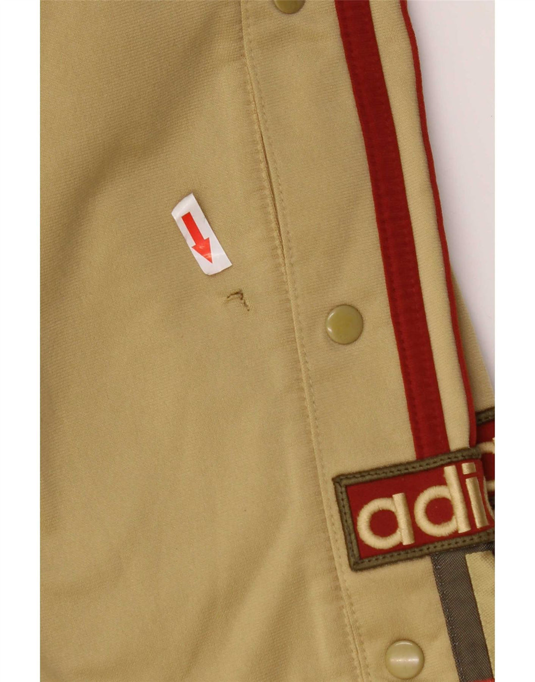 Męskie spodnie dresowe Adidas z grafiką, średni khaki, poliester