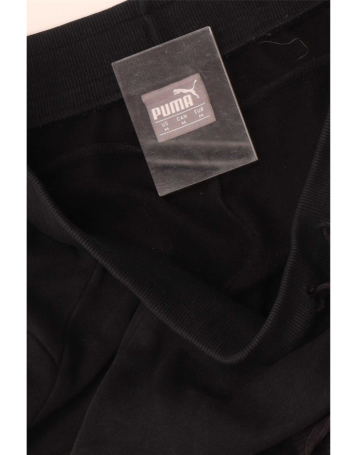 Damskie spodnie dresowe Puma Graphic Joggers UK 14 Medium Black