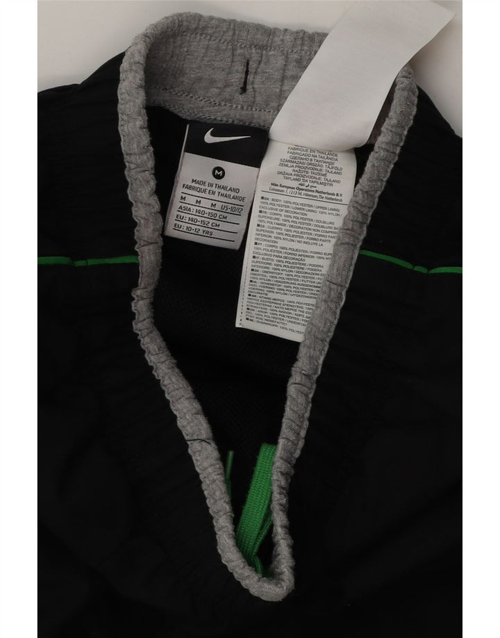 Chłopięce spodnie dresowe z grafiką Nike 10-11 lat, średni czarny poliester