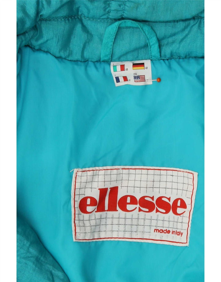 Damski kombinezon narciarski Ellesse IT 46, duży, niebieski, nylonowy, retro
