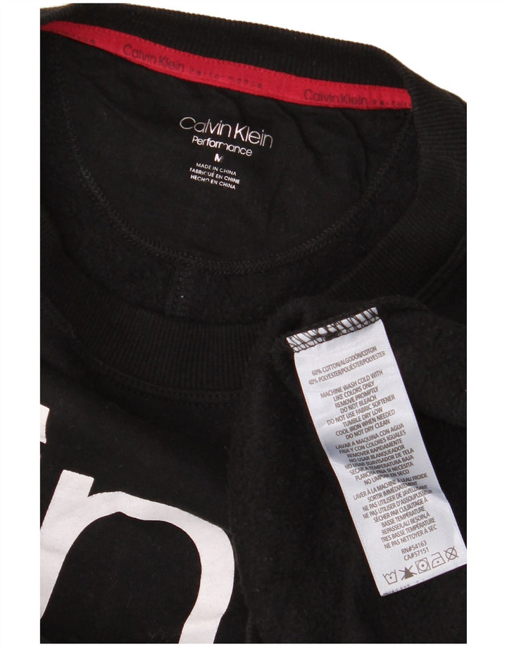 Damska bluza oversize Calvin Klein Graphic UK 14, średnia czarna