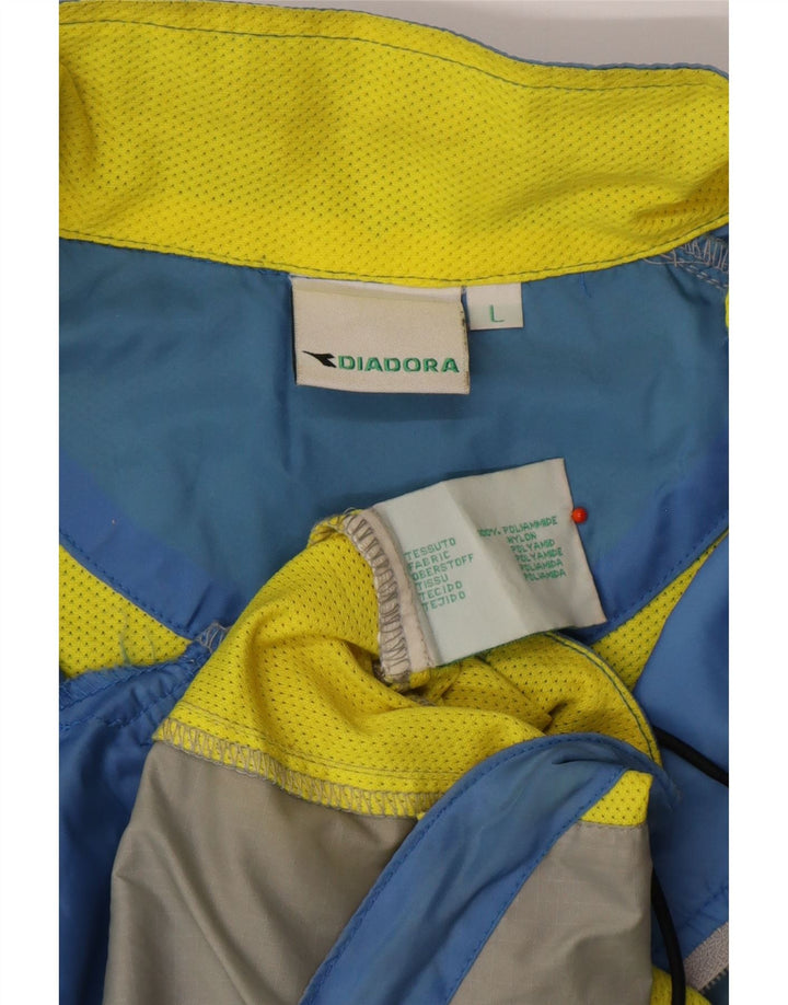 Męska kurtka dresowa DIADORA z grafiką, duża, niebieska, z blokami kolorów, poliamid