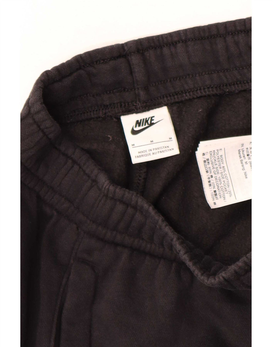 Męskie spodnie dresowe Nike Cargo Graphic, joggery, średnia czarna bawełna