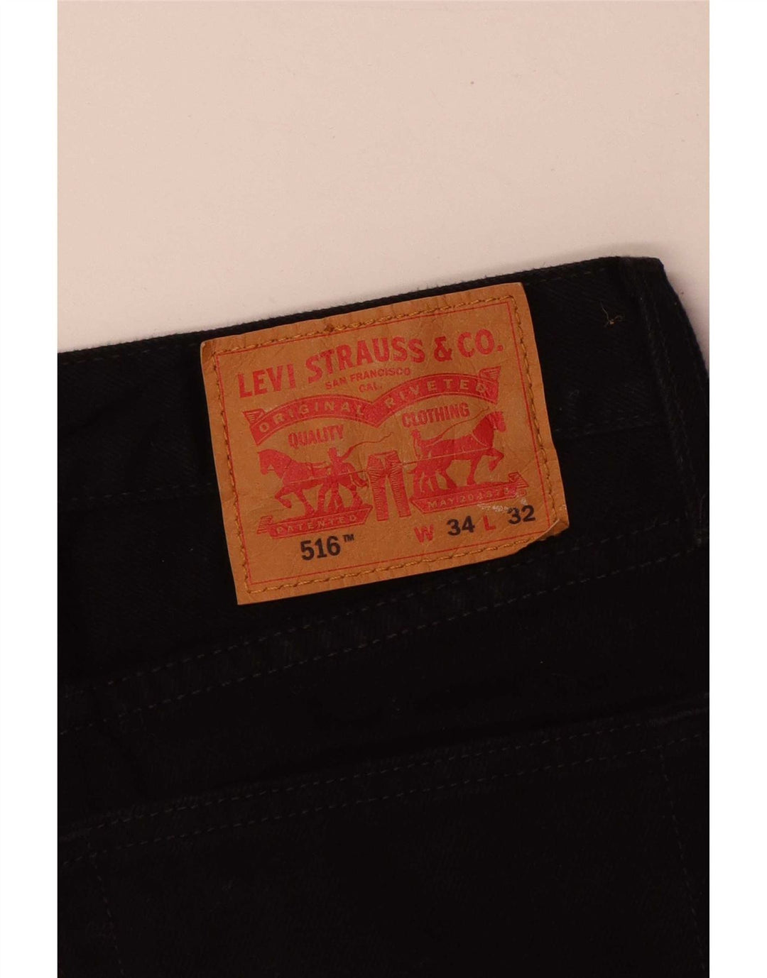 Męskie jeansy Levi's 516 Slim Straight W34 L32 Czarna bawełna