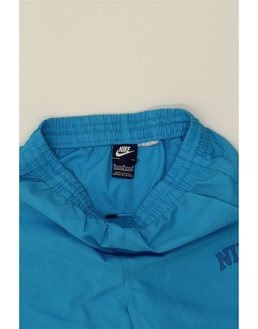 NIKE Boys Graphic Sport Shorts 10-11 Years Medium Blue Vintage Nike and Second-Hand Nike from Messina Hembry 