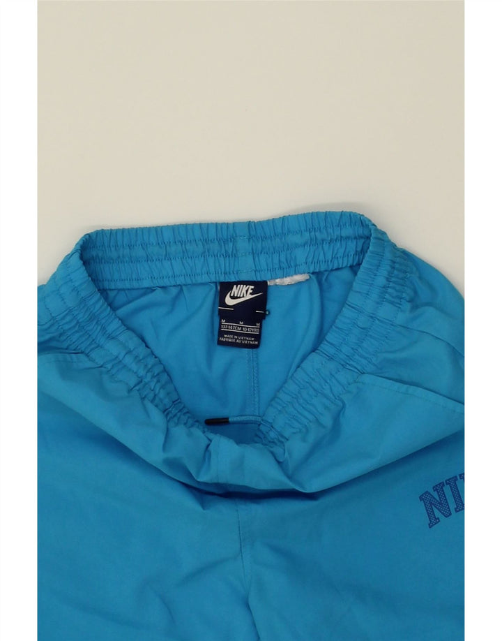 NIKE Boys Graphic Sport Shorts 10-11 Years Medium Blue Vintage Nike and Second-Hand Nike from Messina Hembry 