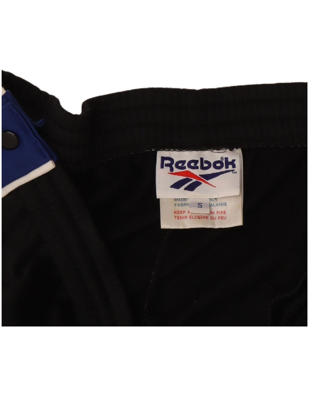 Męskie spodnie dresowe Reebok, małe, czarne, z poliestru w blokach kolorów