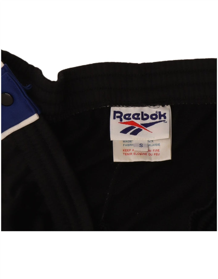 Męskie spodnie dresowe Reebok, małe, czarne, z poliestru w blokach kolorów
