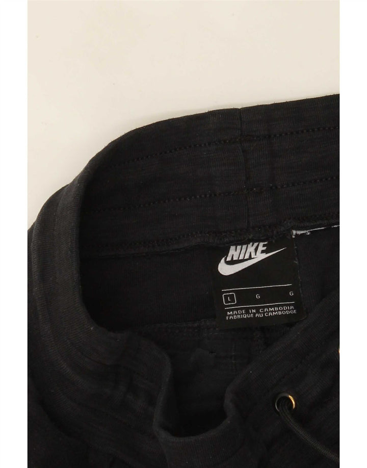 Damskie spodnie dresowe Nike Joggers UK 14, duże czarne