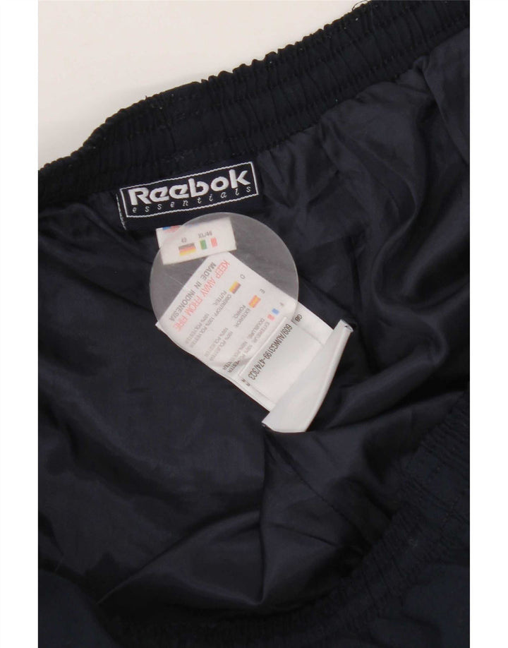 Damskie spodnie dresowe Reebok UK 16, duże, granatowe, poliestrowe