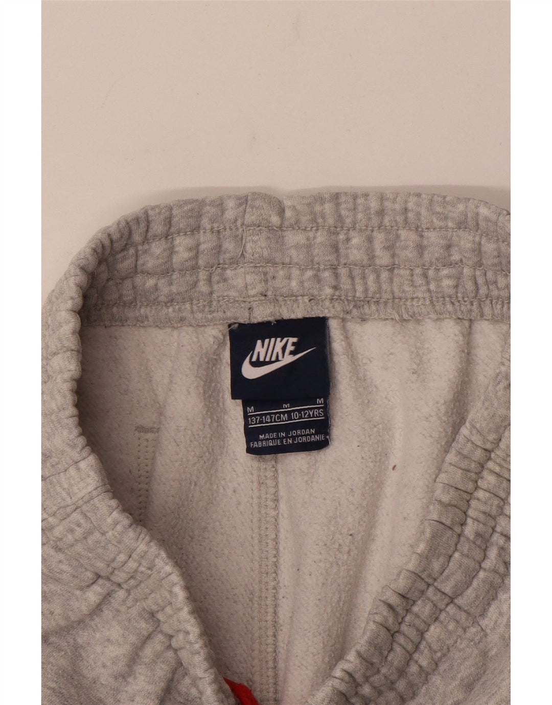 Spodnie chłopięce Nike Dresowe Joggery 10-11 lat, średnioszare, nakrapiane