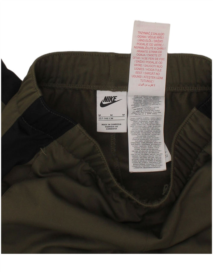 Spodnie dresowe NIKE Climacool dziewczęce Joggery 10-11 lat, średni kolor khaki