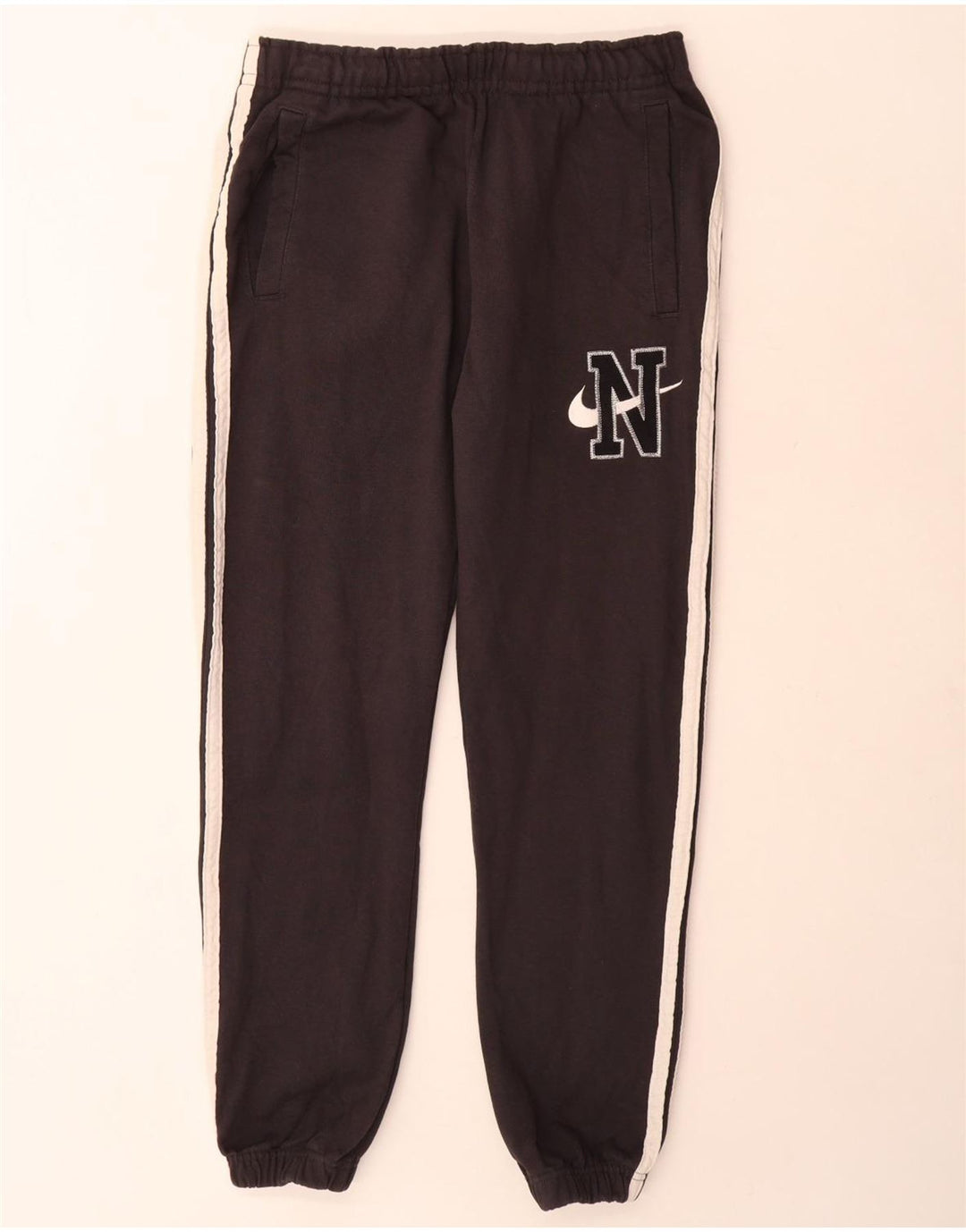 Męskie spodnie dresowe Nike Graphic Tracksuit Joggers w kolorze średniej czerni