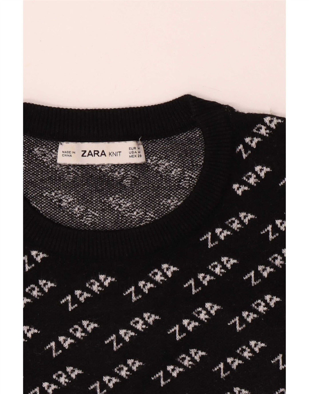 Damski sweter Zara z graficznym wycięciem pod szyją UK 14, średni czarny