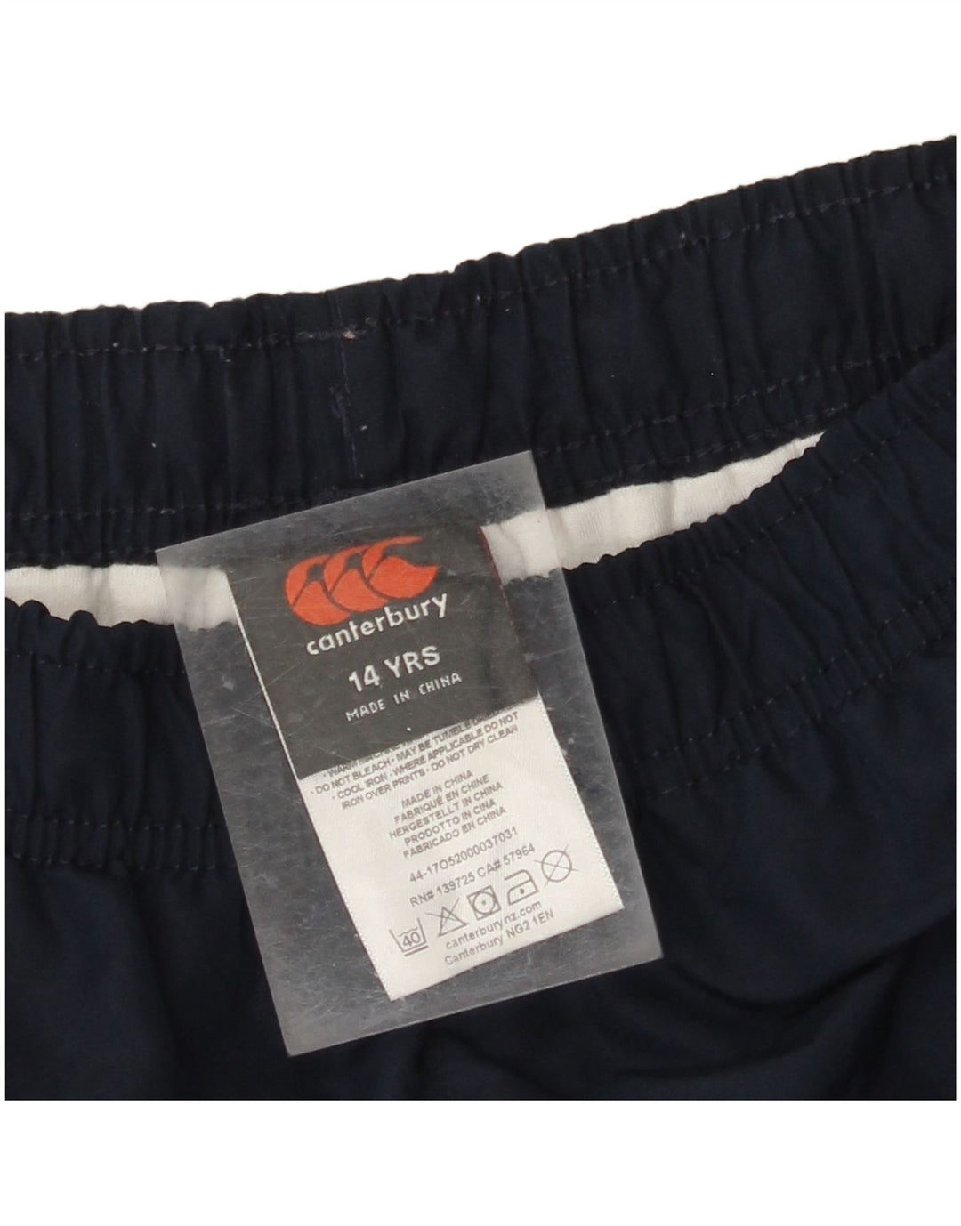 Spodnie wiatrówkowe CANTERBURY dziewczęce z grafiką 13-14 lat, granatowe