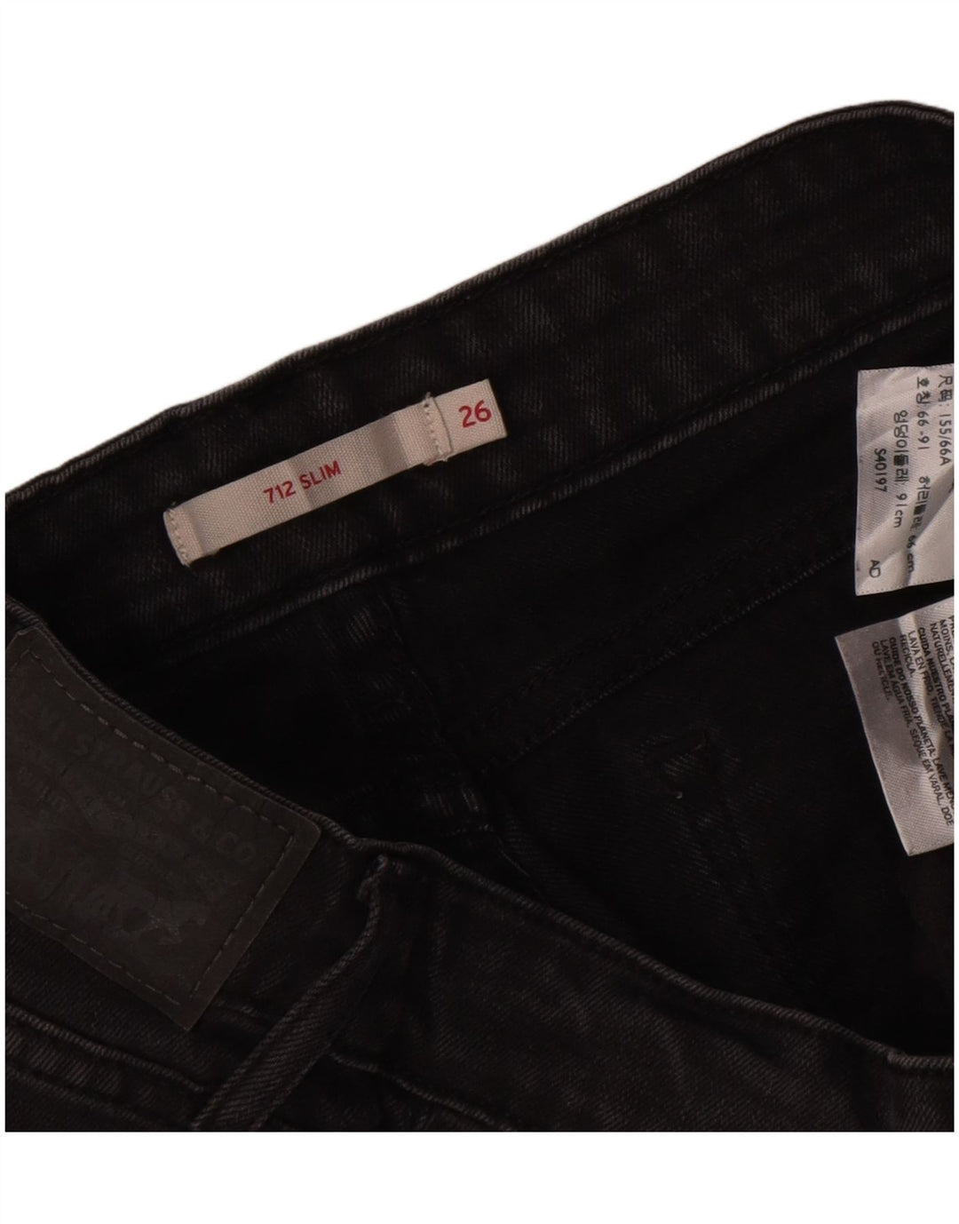 Damskie jeansy Levi's 712 Slim W26 L29 Czarna bawełna