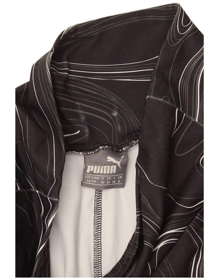 Damskie legginsy Puma z abstrakcyjnym wzorem UK 8, małe czarne geometryczne