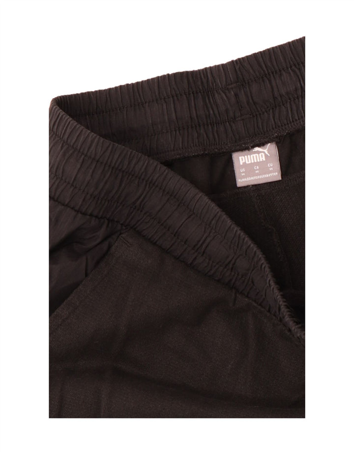 Męskie spodnie dresowe Puma Graphic Medium Brown